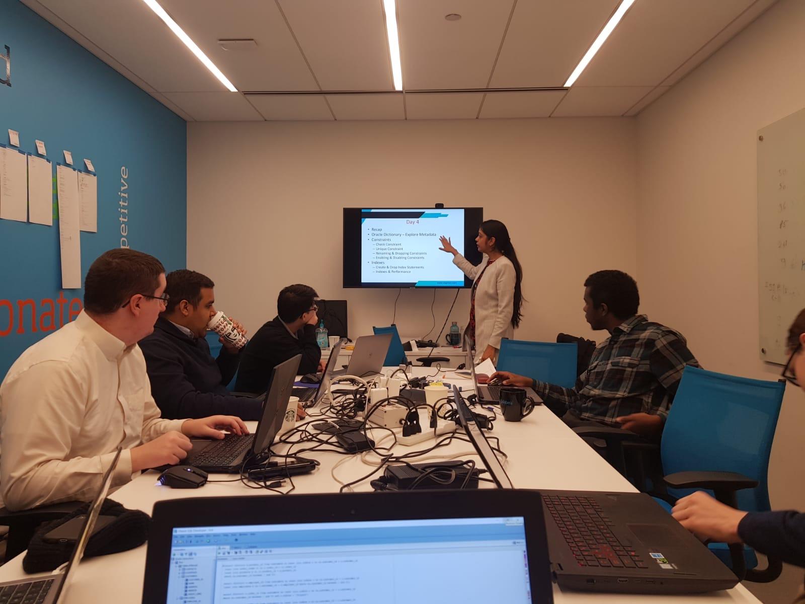 Cohort presenting capstone projects